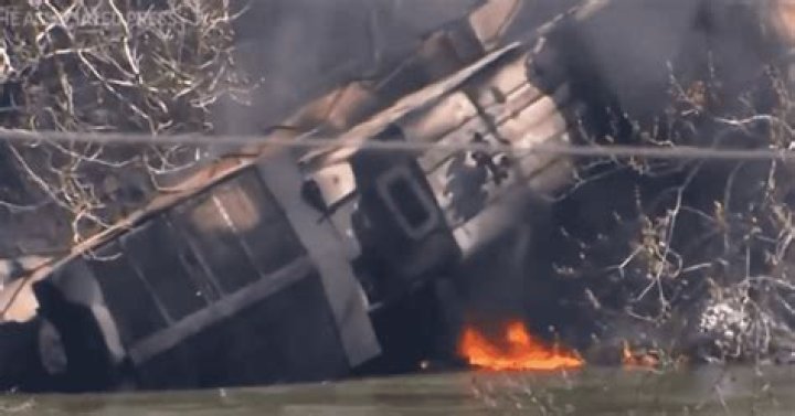 
3 injured as freight train derails after hitting rockslide in West Virginia, spilling diesel into river 